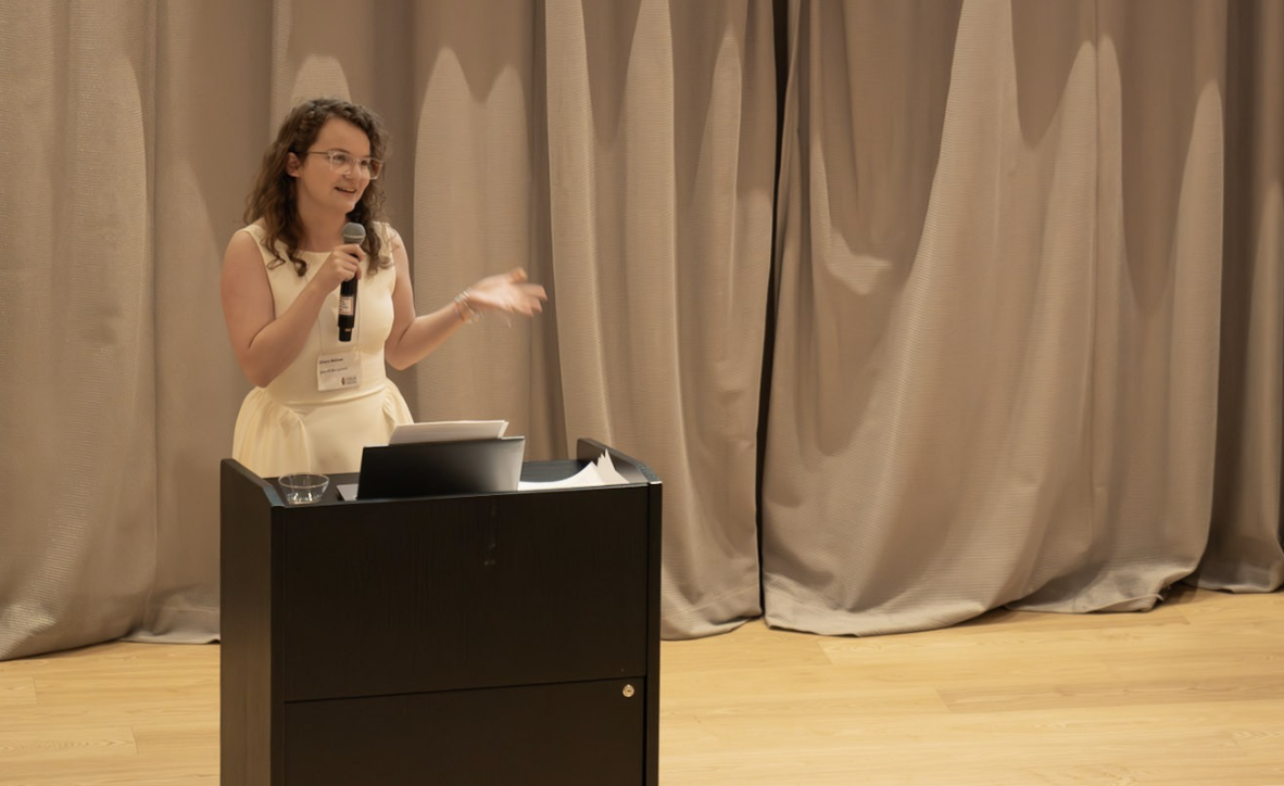 Grace Nelson delivering thank you remarks at the June 2026 College of Arts Convocation Awards Ceremony in the MacKinnon Auditorium in the Arts Research Centre at the University of Guelph.