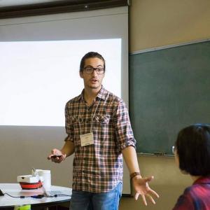 An office staff member delivers a presentation