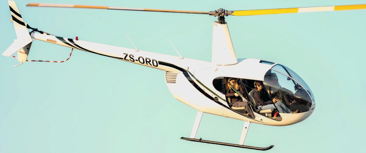 Jenn Smith in a helicopter