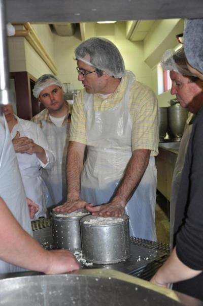 Professor Art Hill teaching cheese making course in pilot plant