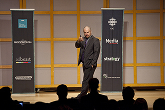 Norm presenting at conference
