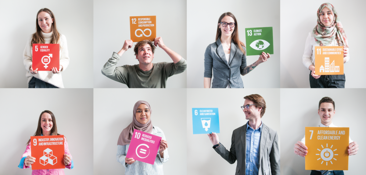 students holding sustainable development goals