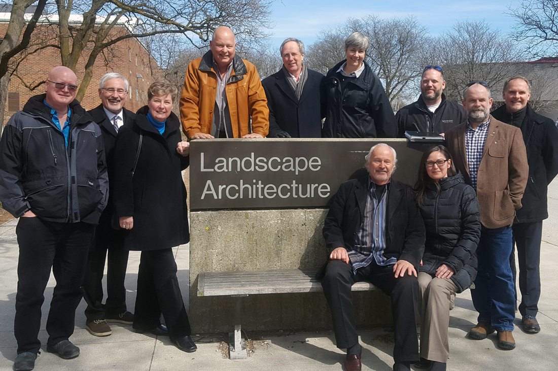 LAAA members stand outside with Landscape Architecture sign