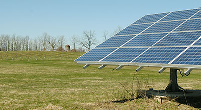 Farmers field with large solar panel