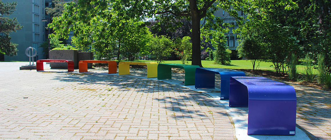 Rainbow benches on campus.
