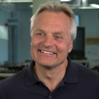 Alfons smiling in polo shirt