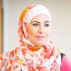 Rana in floral orange and pink hijab 