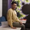 Gagan (Sky) Umesha sits casually on a table in a mathematics lounge at the University of Guelph.