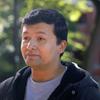 A 3 quarter headshot of David Quecan Cortes on a sunny day.