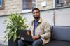 Kevin Pirabaharan, MCLC student, on a computer in the summerlee science complex