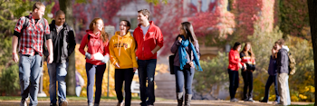 students walking and talking outside of johnston hall