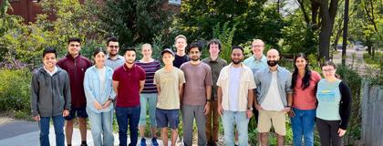 Large group of people smiling for the camera at the CSAI Orientation.