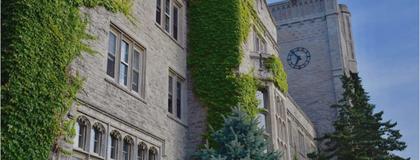 Johnston Hall covered in green ivy