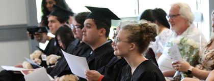 Graduating students seated at their convocation ceremony.
