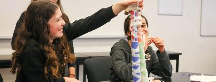 Creative Encounters campers build a tower