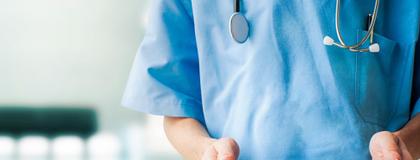 Health-care worker holding a clipboard
