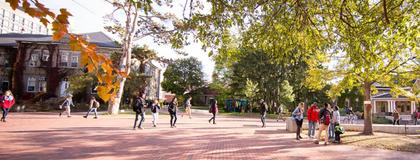 Panoramic shot of students walking on Winegard Walk on the University of Guelph campus