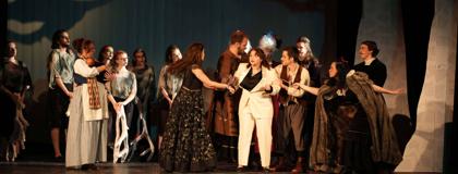 Students performing in into the woods the musical