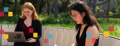 students in lang plaza on a computer