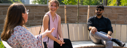 students talking in Lang Plaza