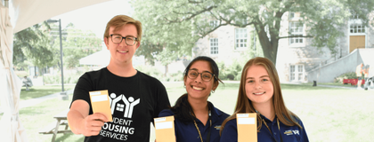 Group of Facilities Desk Workers holding residence keys