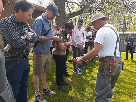 One Health Policy Fellowship Cohort examines bee hive frame