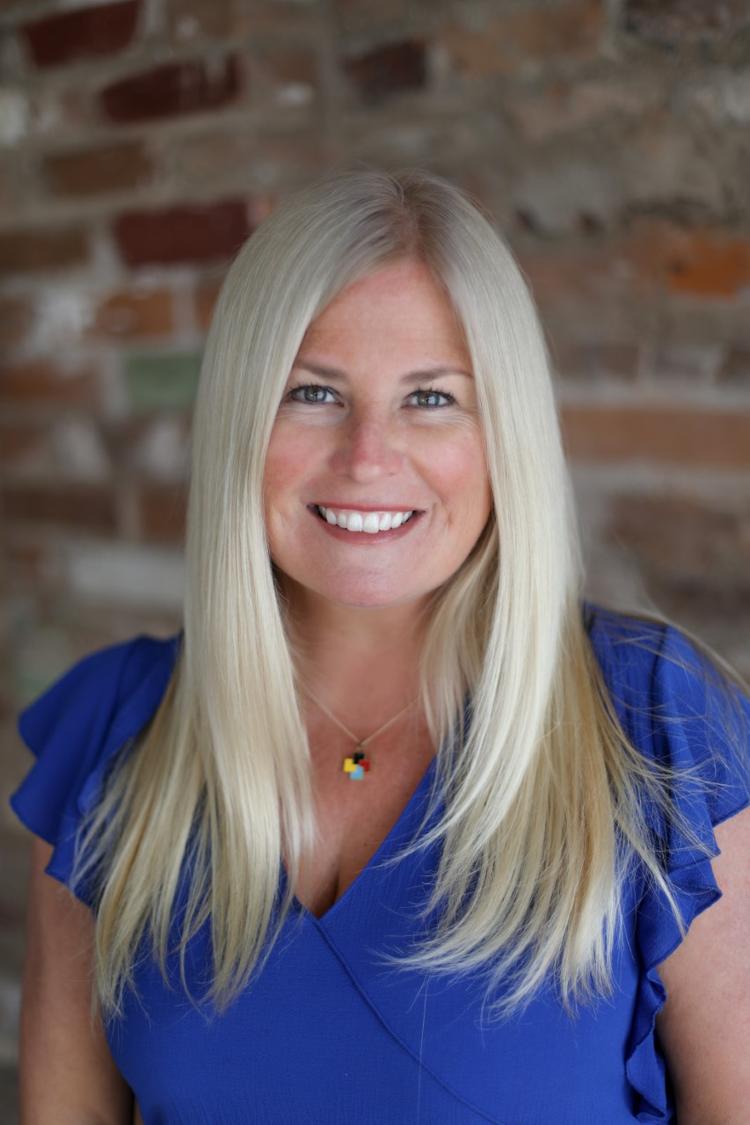 large photo of dean sara mann