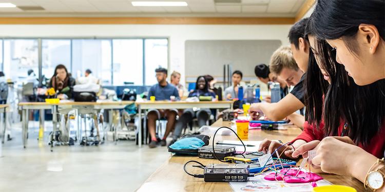 Group of students working in the SHAD workshop.