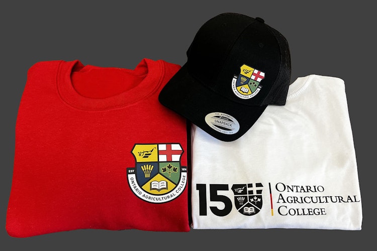 OAC apparel, which includes a red sweater, a white t-shirt and a black ball cap.