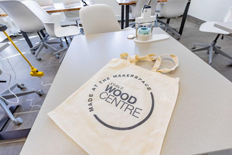 Tote bag with the text ' Made in the MakerSpace - John F. Wood Centre'