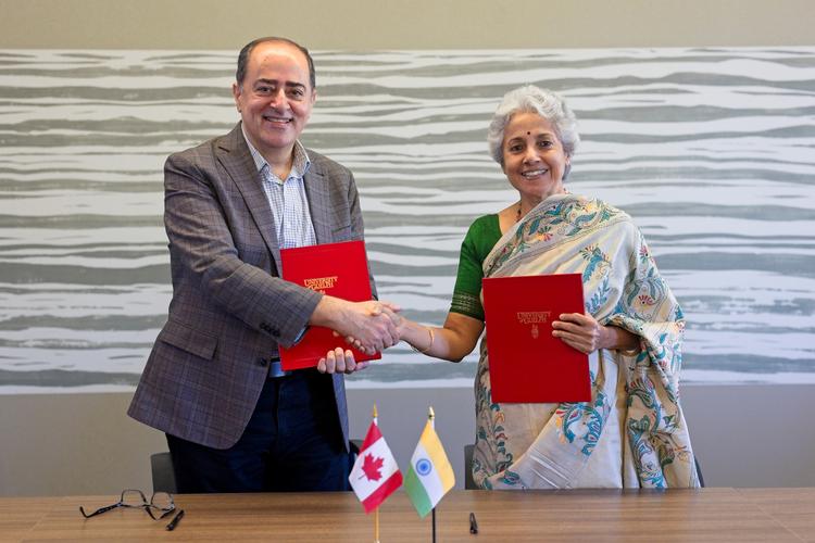 photo of a woman and man shaking hands