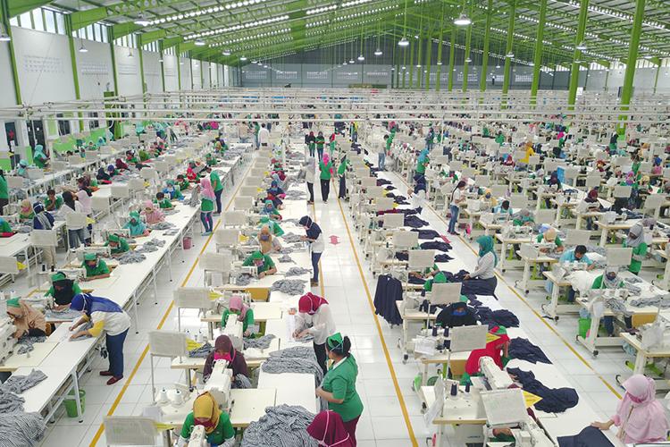 Garment workers in a factory in southeast Asia