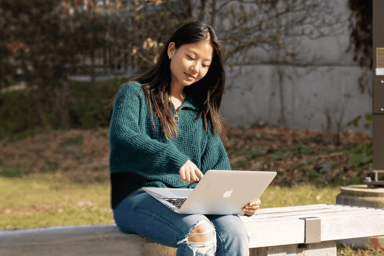 Student working on her laptop