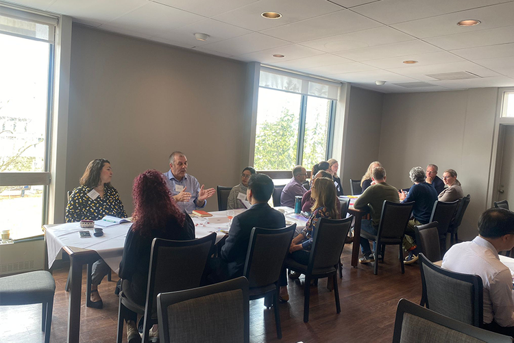 Uk delegates engaged in conversations.