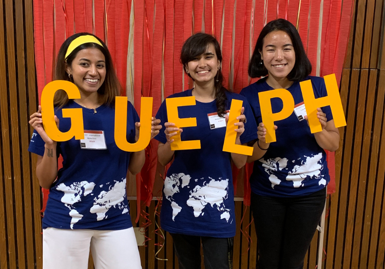Students holding letters up that spell guelph
