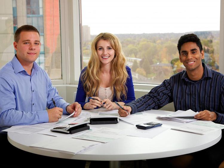 three-employees-in-a-meeting