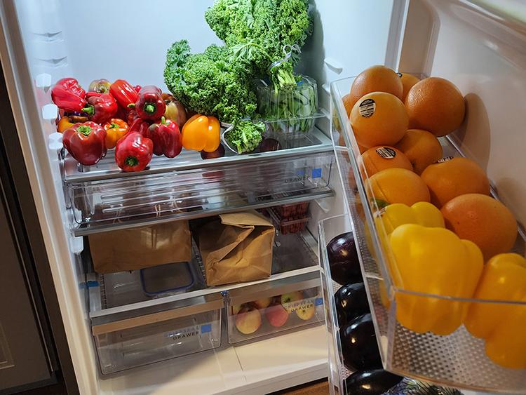 Fridge loaded with fruits and vegetables