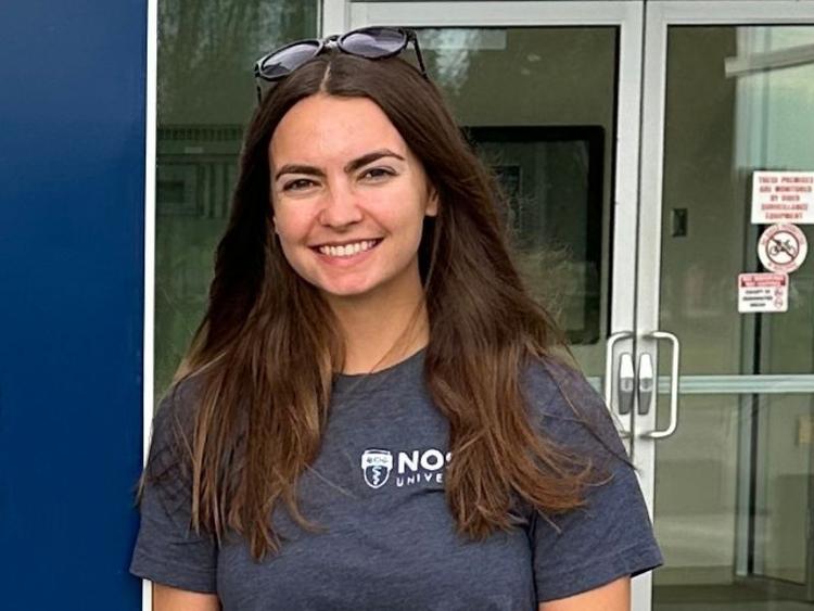 Grad Sarah Ribey outside med school