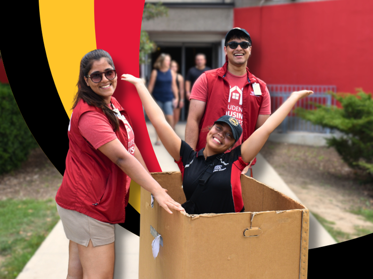 Residence Life Staff in a packing box