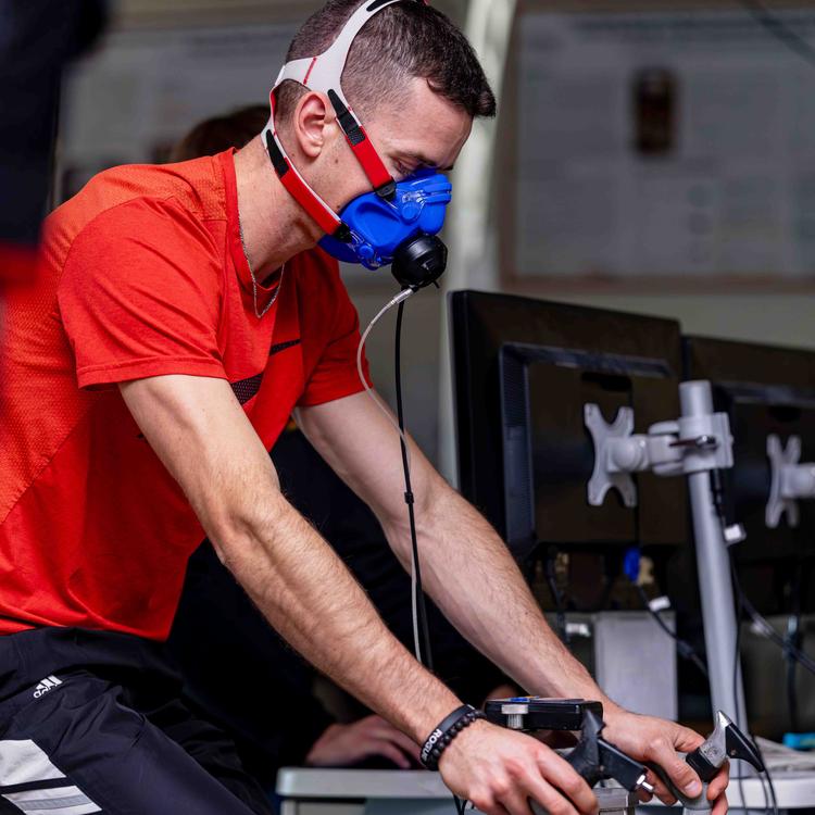 Student on a stationary bike