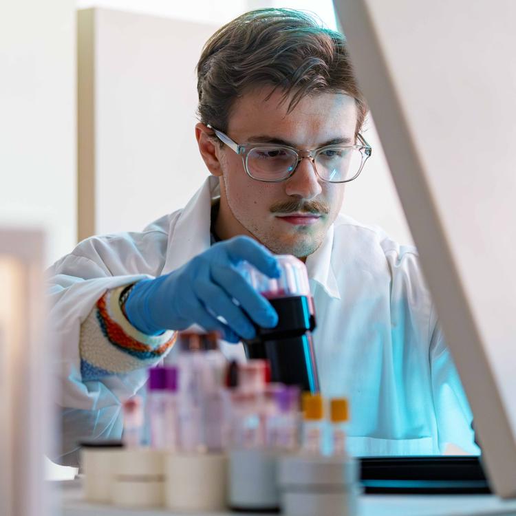 Student uses a centrifuge