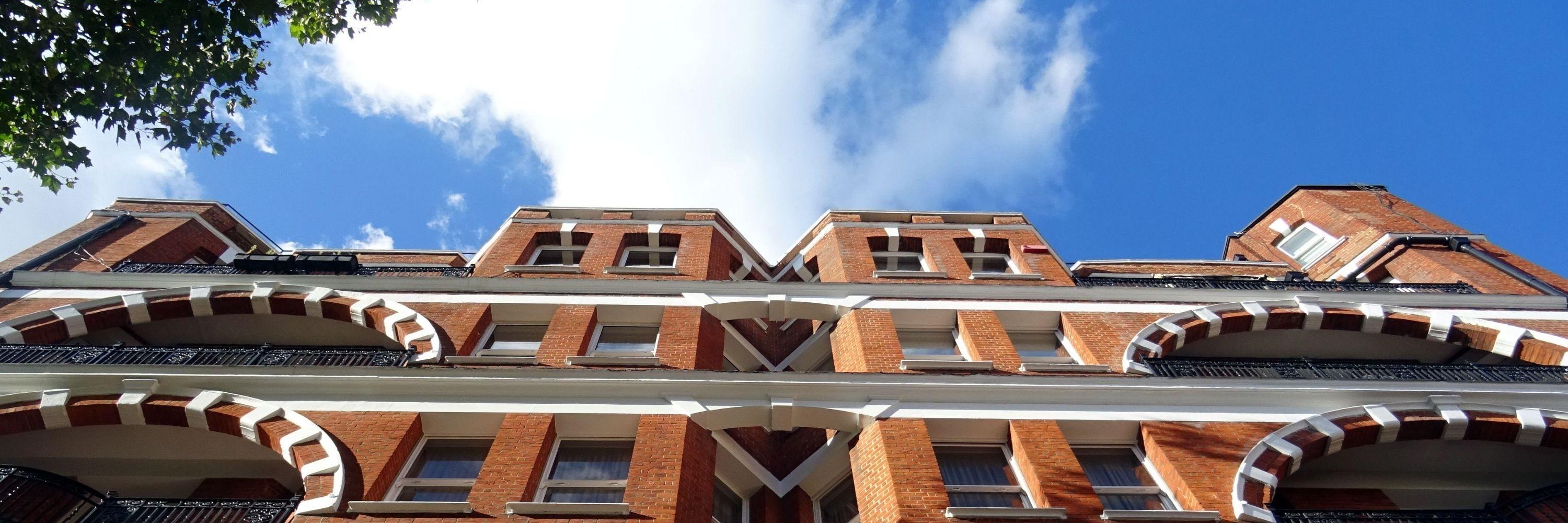 Apartment building with sky
