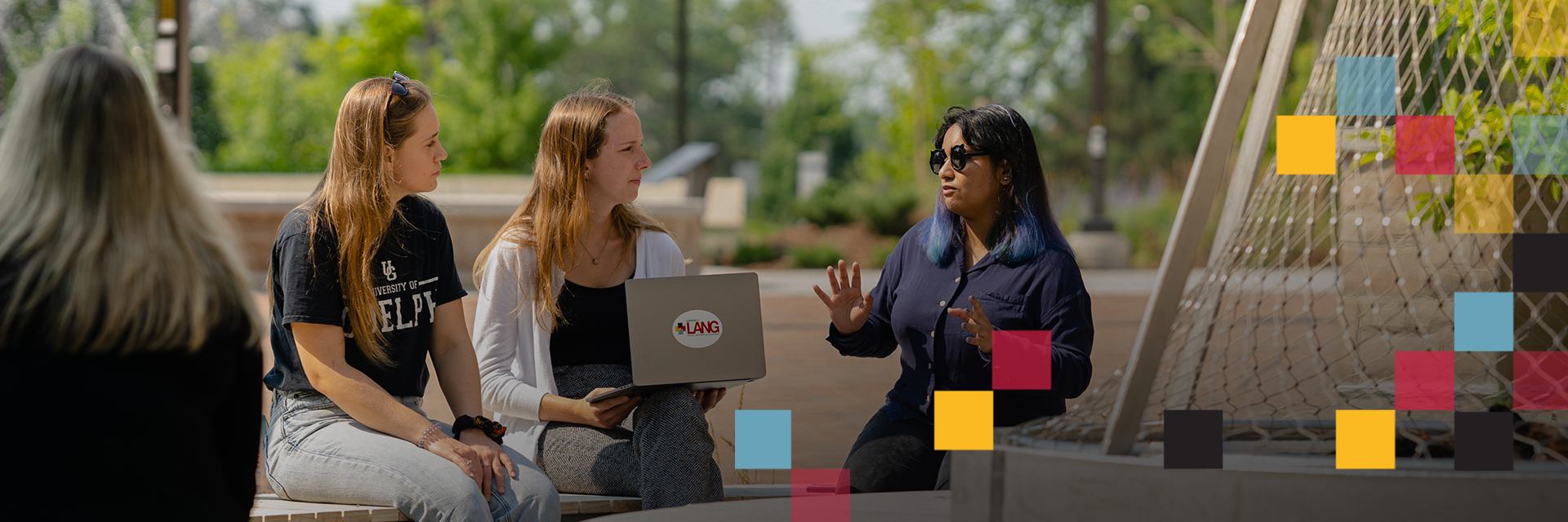 commerce students talking to each other in Lang Plaza
