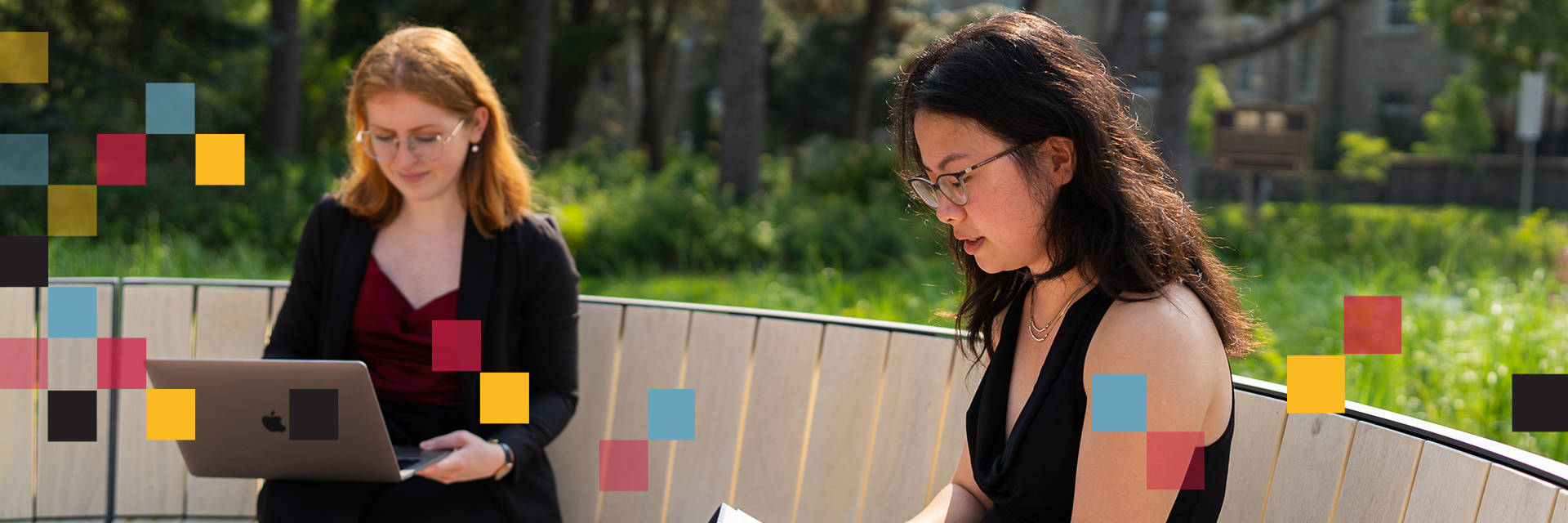 students in lang plaza on a computer