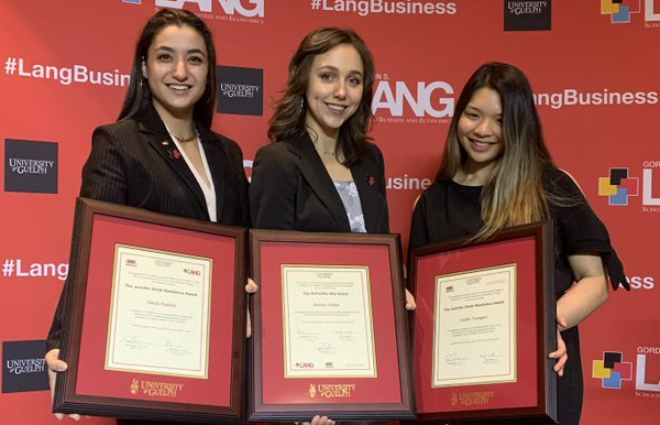 students holding scholarships