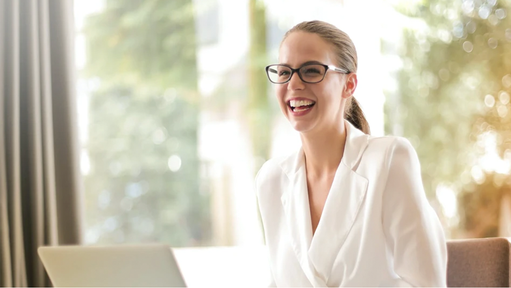 Woman laughing.