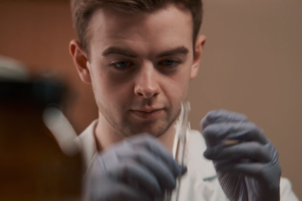 Physics student in a lab