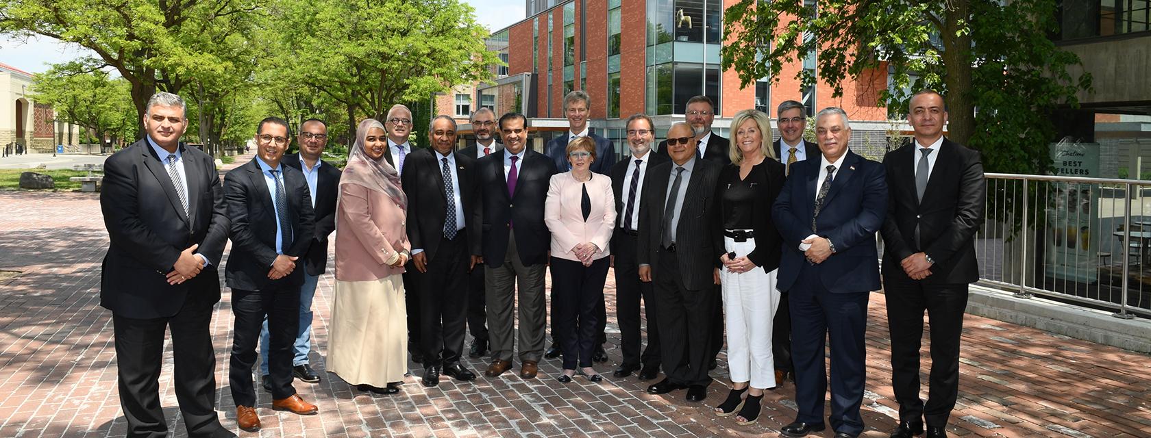 a large group of people standing together for an image