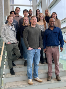 a group of people standing on a staircase
