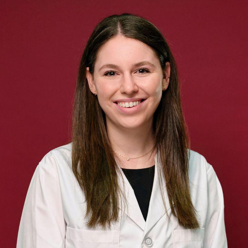 Portrait of med student wearing lab coat.